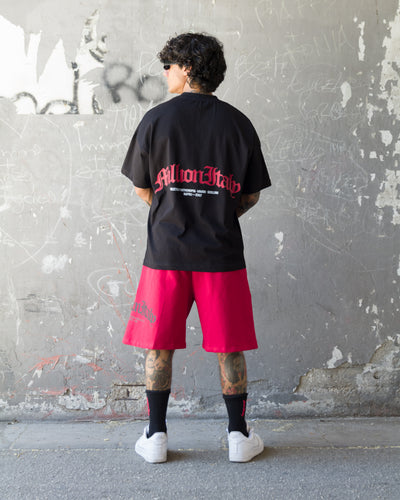 Camiseta Negra Logo Arco Rojo